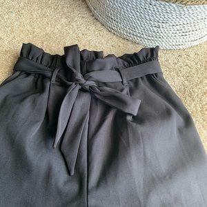 Black cropped leg slack style pants